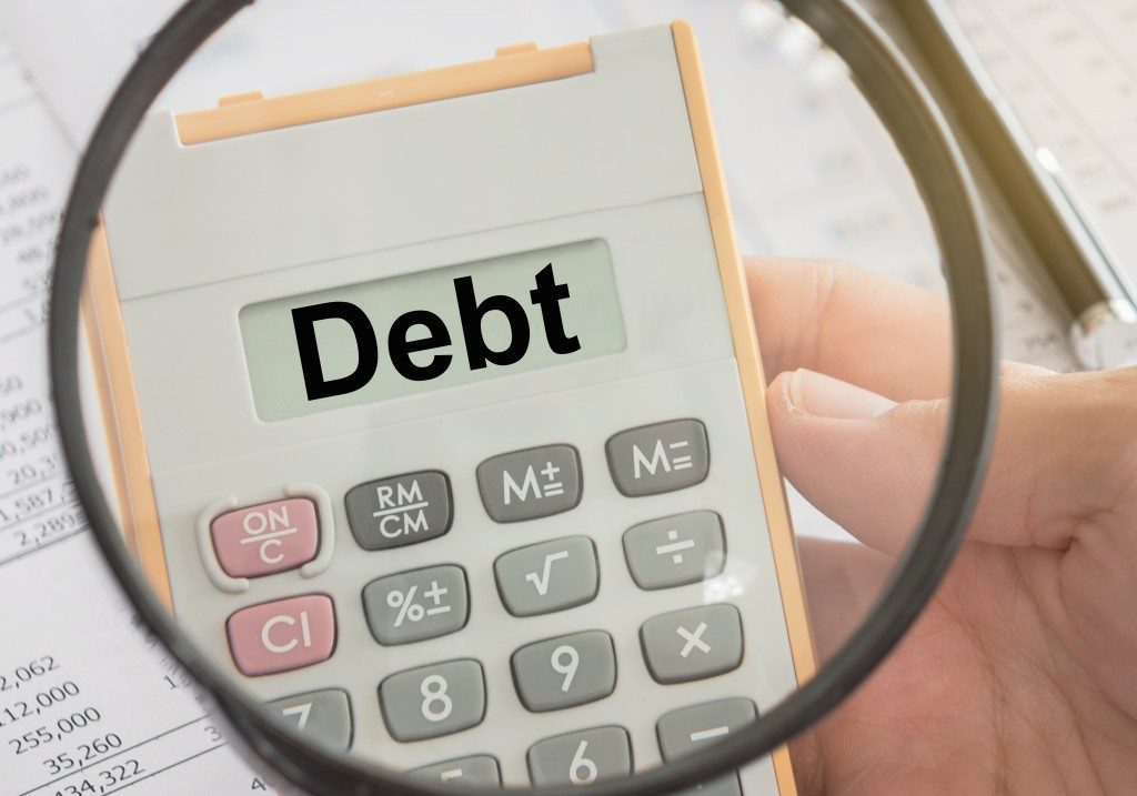 Debt Text on Calculator