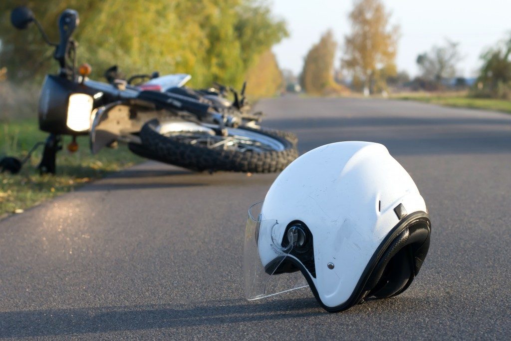 Helment and motorcycle on the road