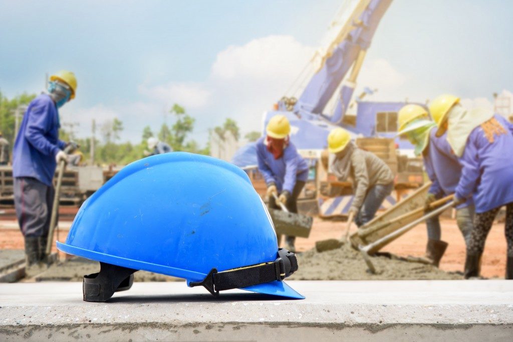 blue hard hat at a construction site