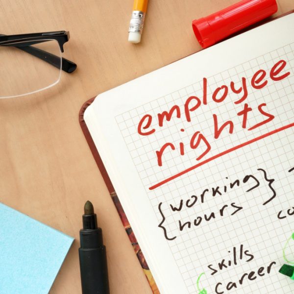 employee rights keywords written in a grid notebook