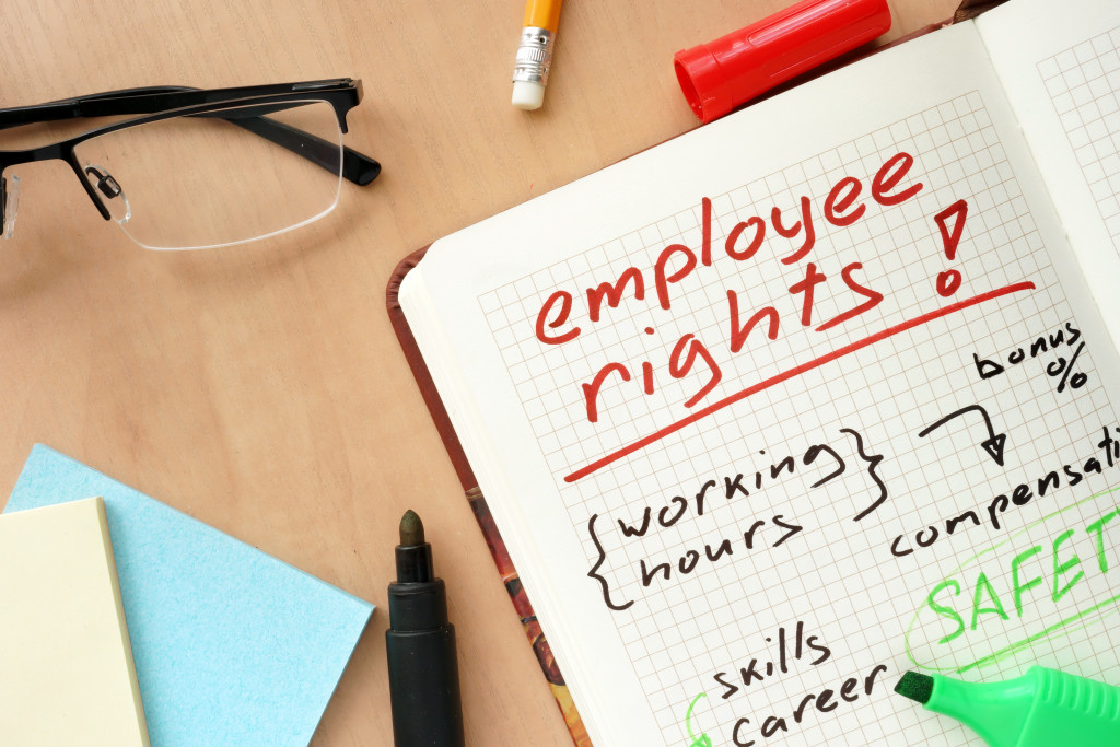 employee rights keywords written in a grid notebook